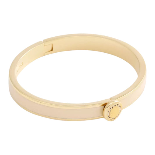 Brazalete Coach Dorado/beige letras negras