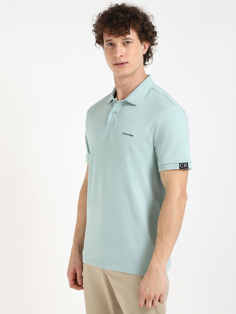 Playera Calvin K verde menta, polo con logo en manga para caballero