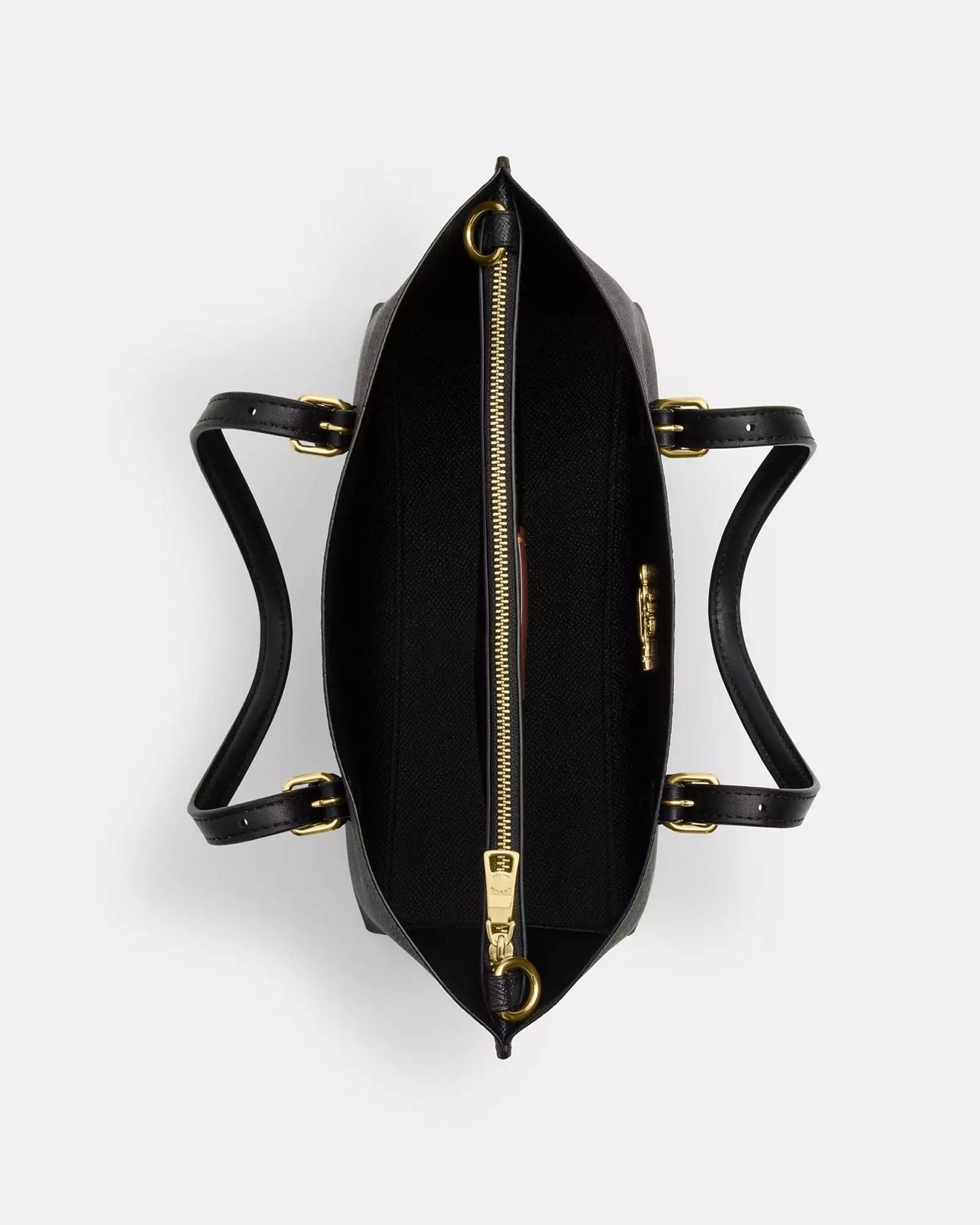 Mini Tote Coach chocolate con canvas en negro, doble strap y placa dorada