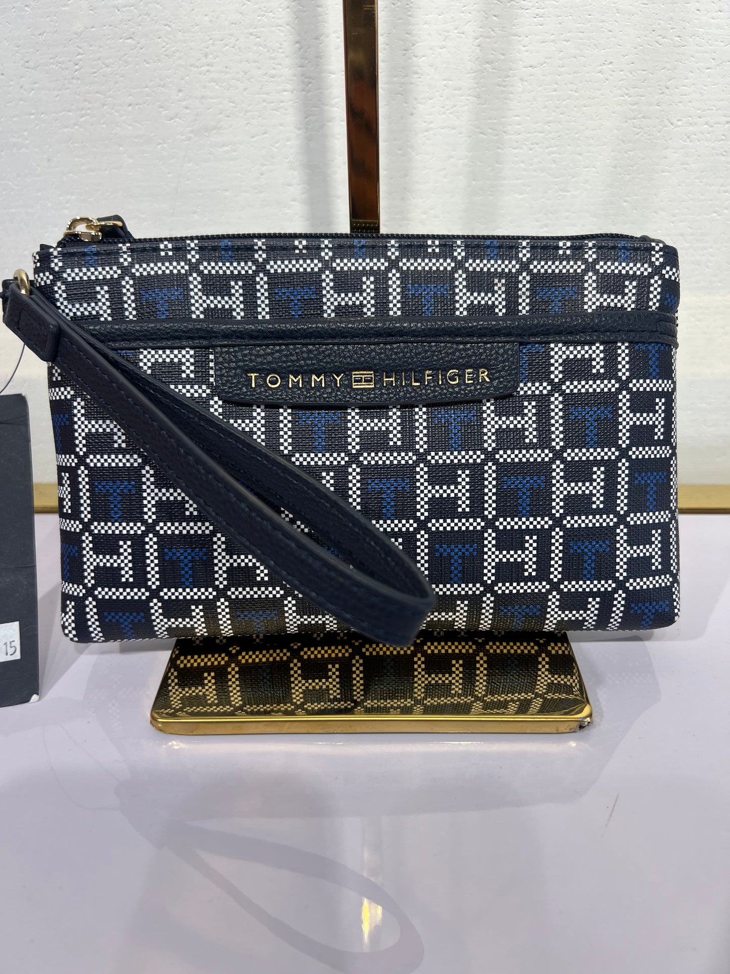 Muñequera Tommy H azul marinl con monogram azul y blanco