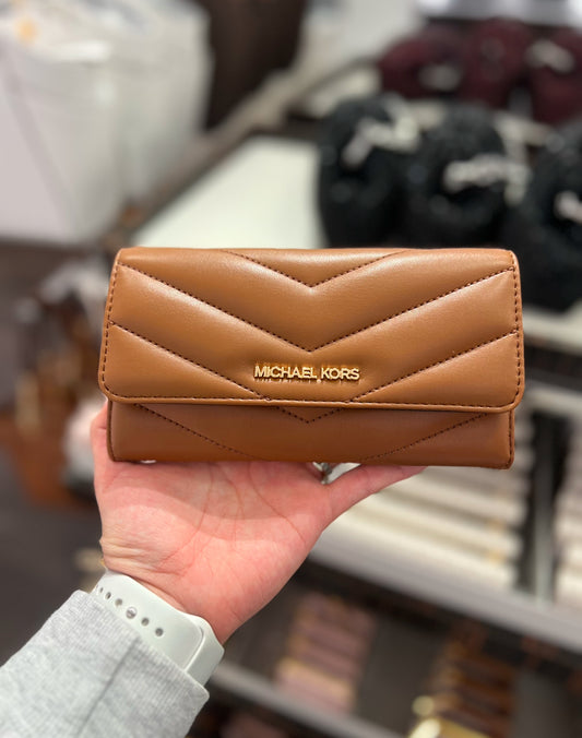 Cartera Michael K café acolchonada