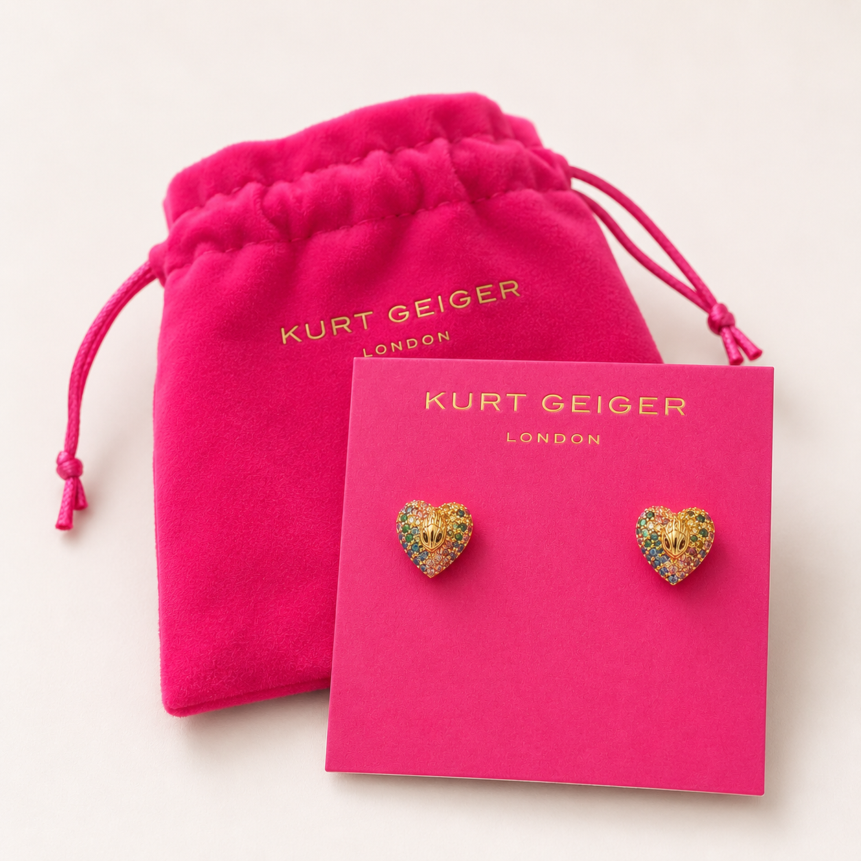 Aretes Kurt Geiger London corazón piedras