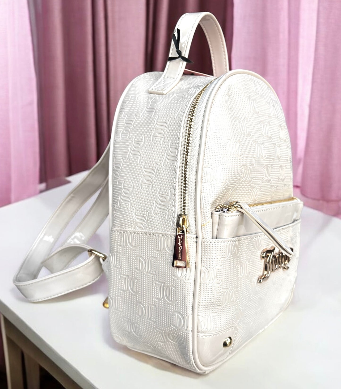 Backpack Juicy C beige con placa dorada