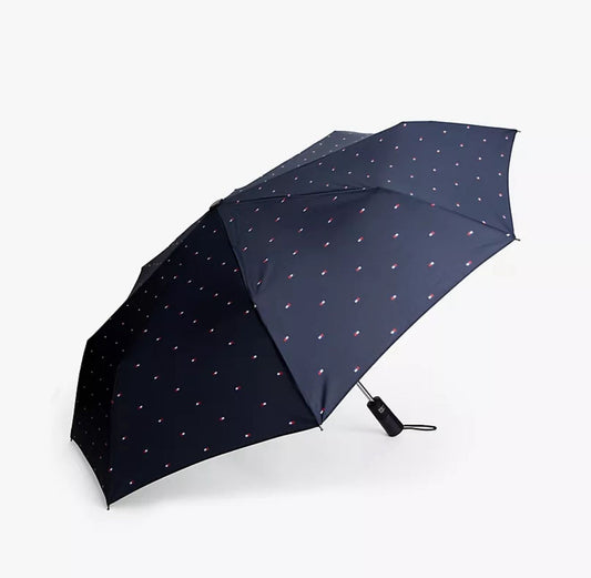 Sombrilla Tommy H azul marino, banderitas y botón abrir/cerrar