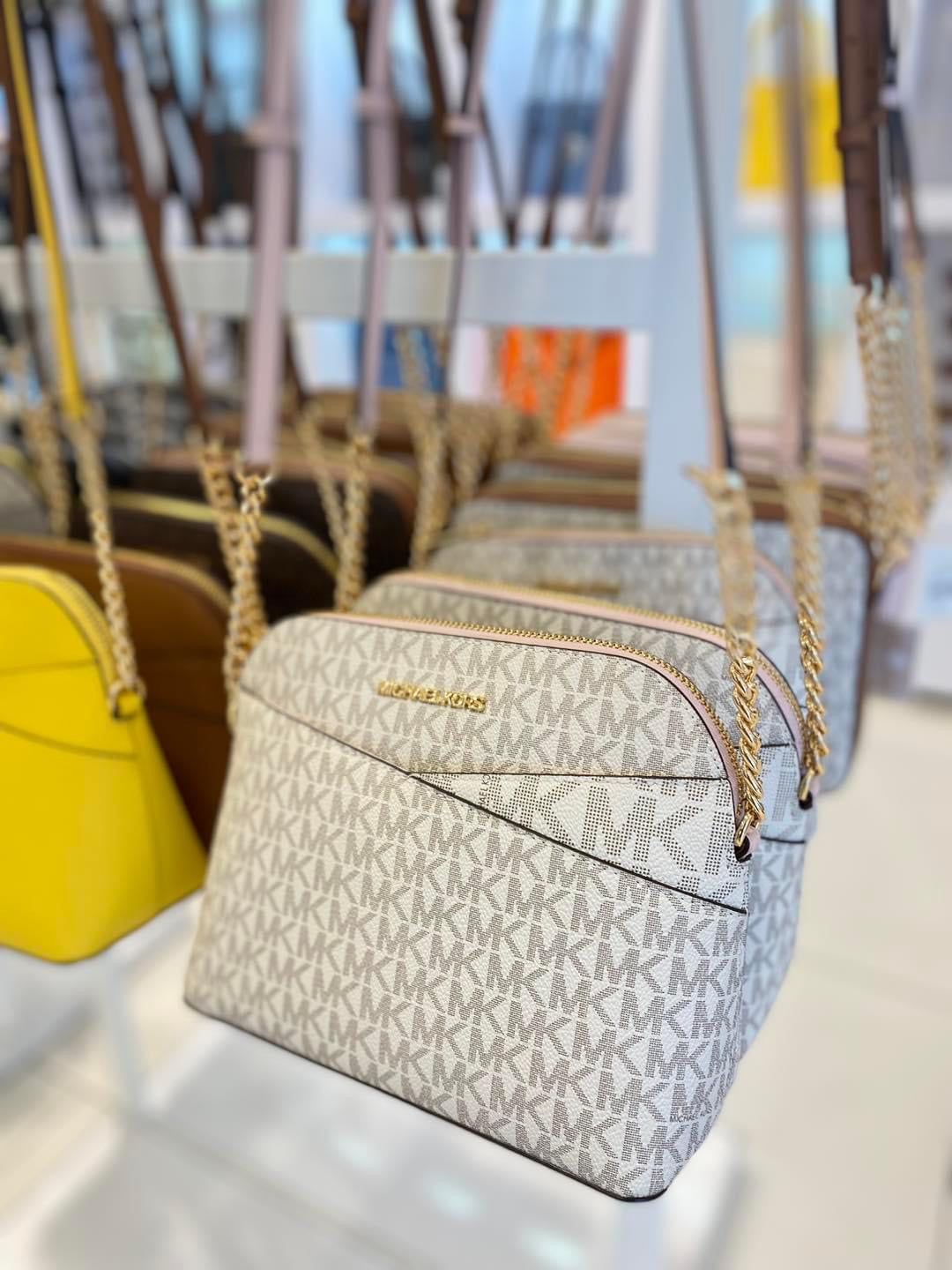 Crossbody Michael K Vanilla/rosa con monogram