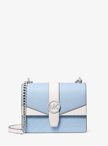 Crossbody Michael K azul claro con blanco, strap con cadena