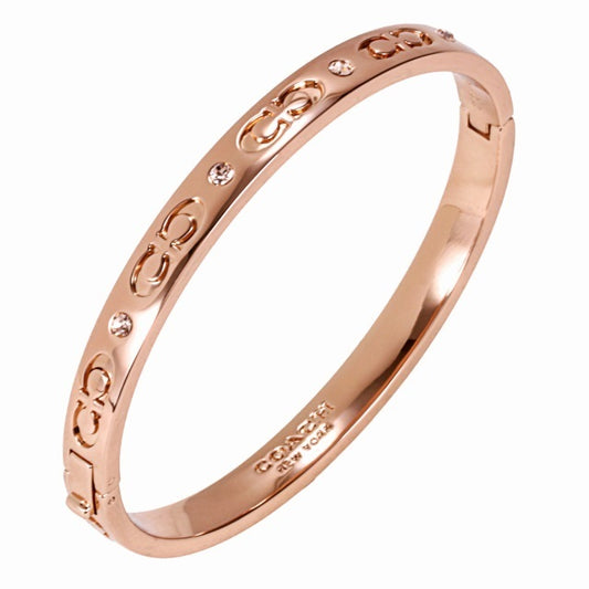 Brazalete Coach rose gold