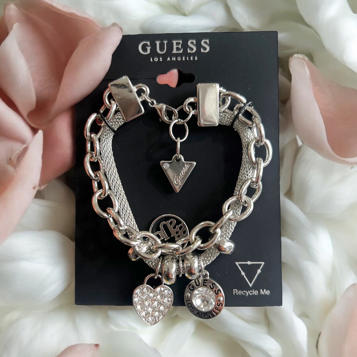 Pulsera Guess cadena plata con 3 dijes