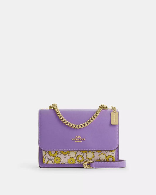 Crossbody Klare Coach bag lila con flores
