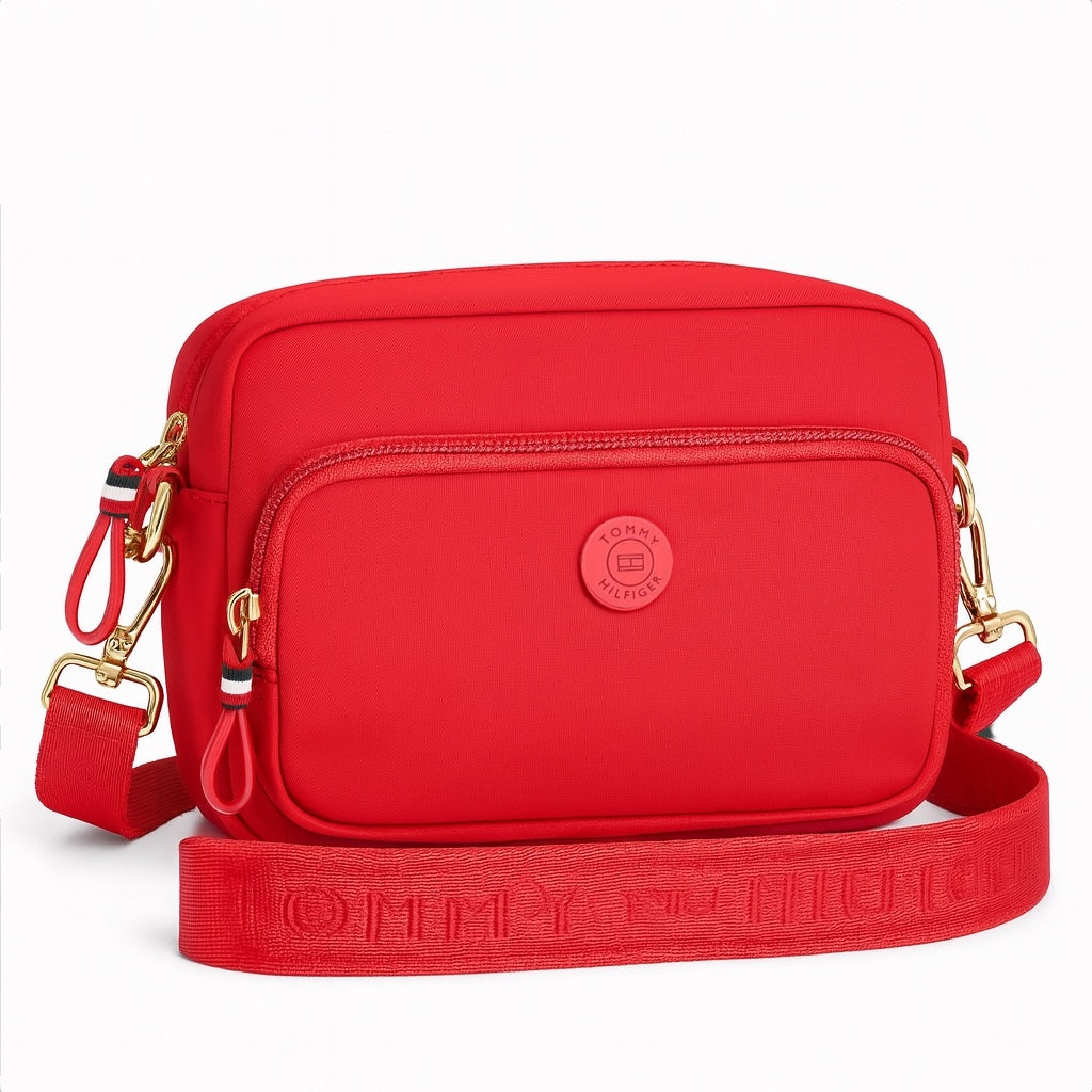 Crossbody Tommy H textil roja con placa de goma roja