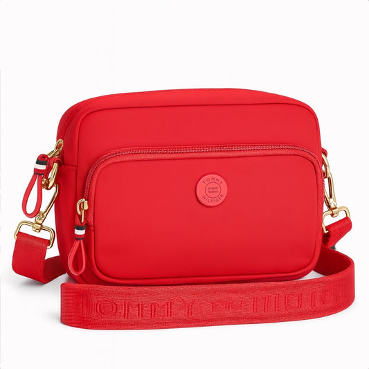 Crossbody Tommy H textil roja con placa de goma roja