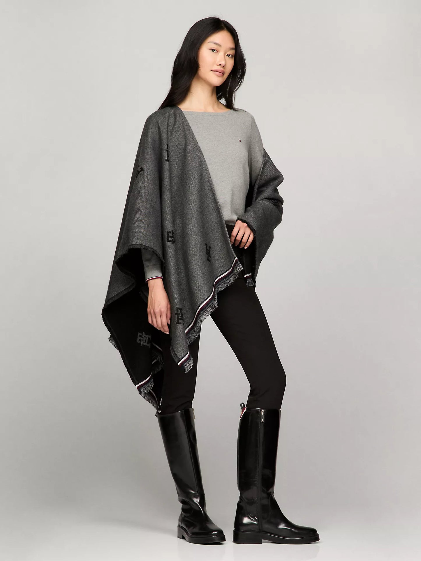 Poncho Tommy h doble vista negro/gris