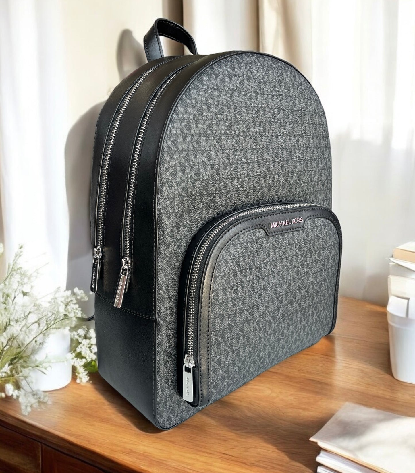 Backpack Michael K negra con monogram doble cierre