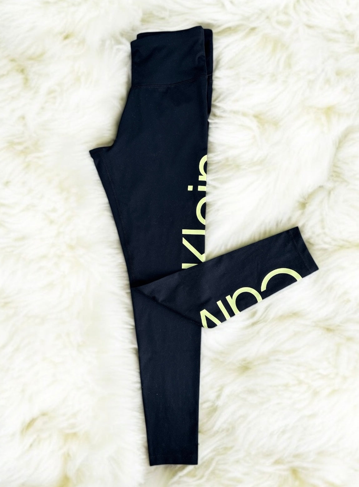Leggings Calvin K negro con letras doradas