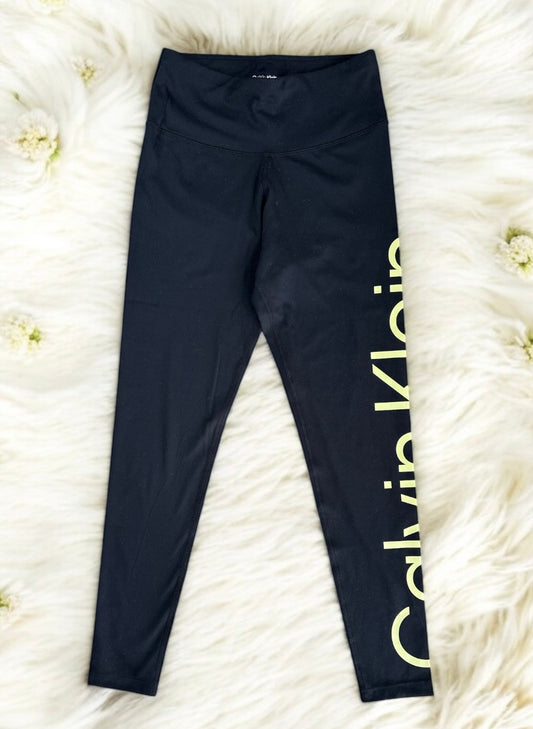 Leggings Calvin K negro con letras doradas