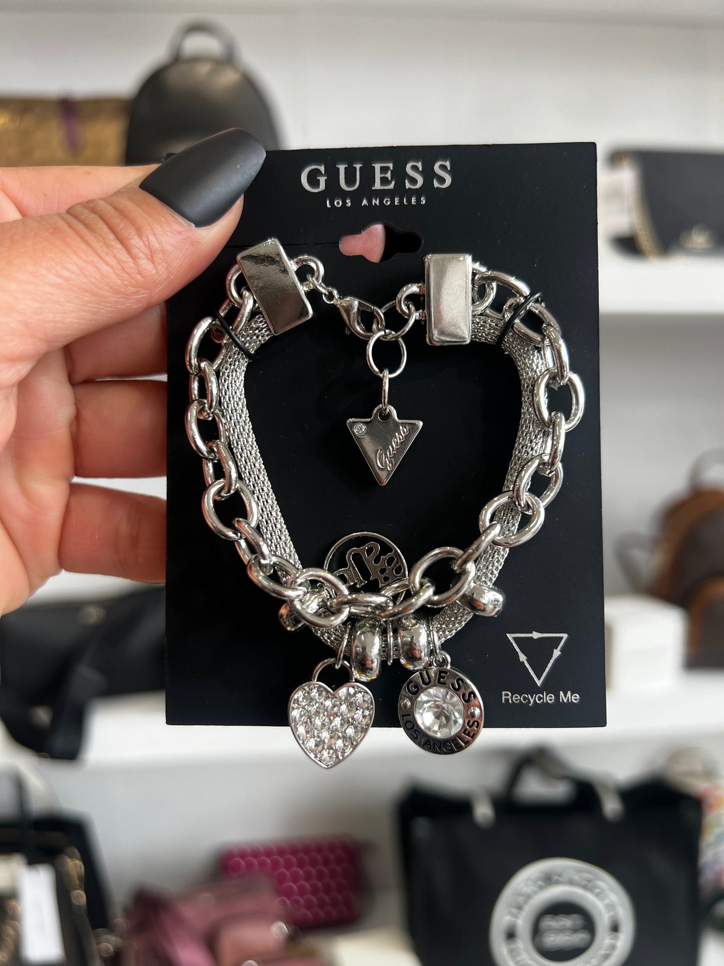 Pulsera Guess cadena plata con 3 dijes