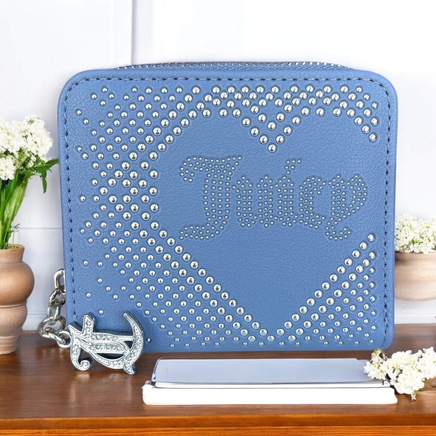 Cartera Juicy C azul con brillo plateados