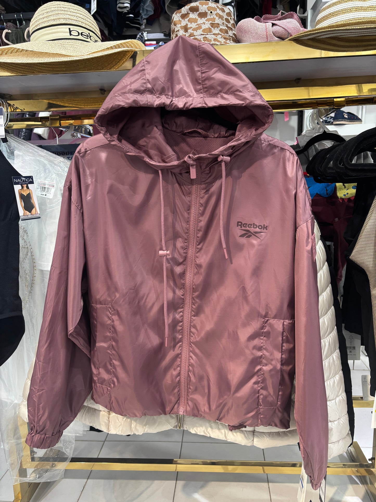Rompevientos Reebok rosa marrón