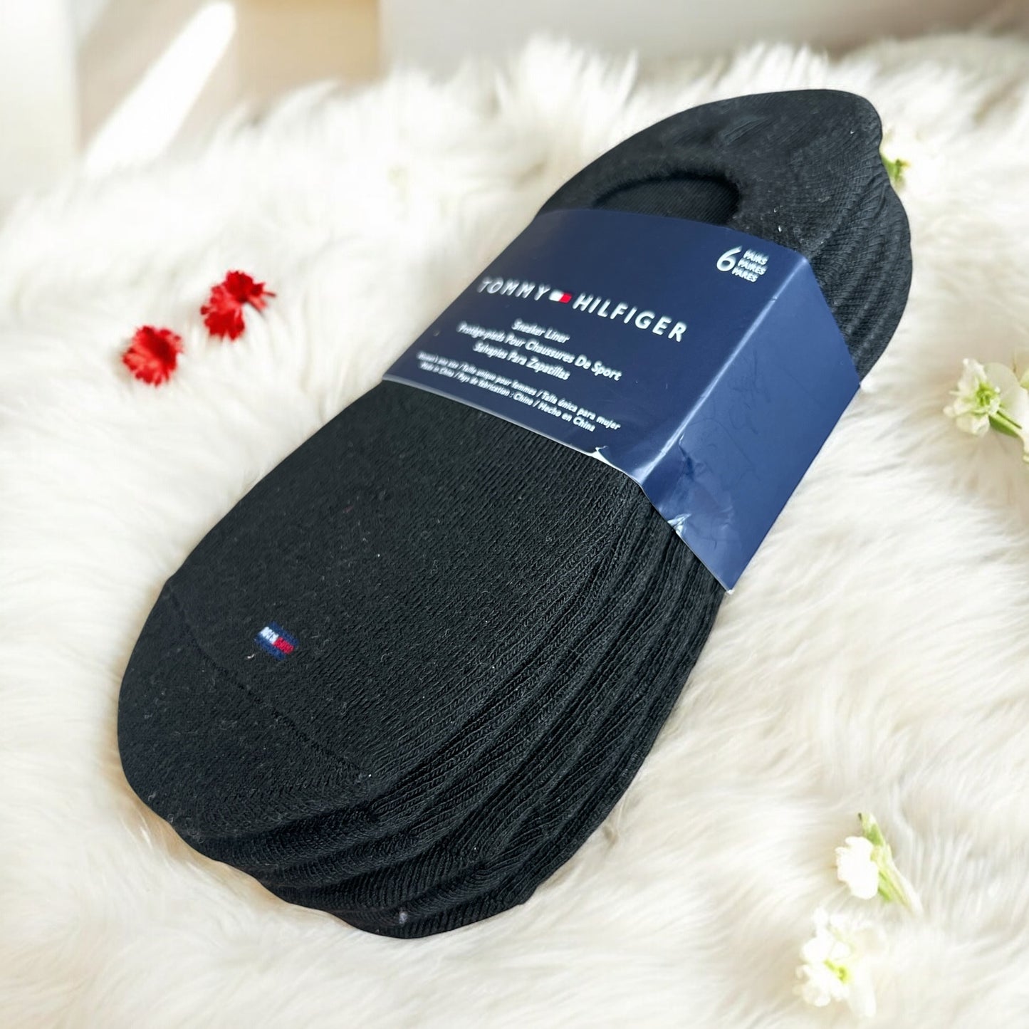 Protectores Tommy H negro con bandera pequeña y letras verdes