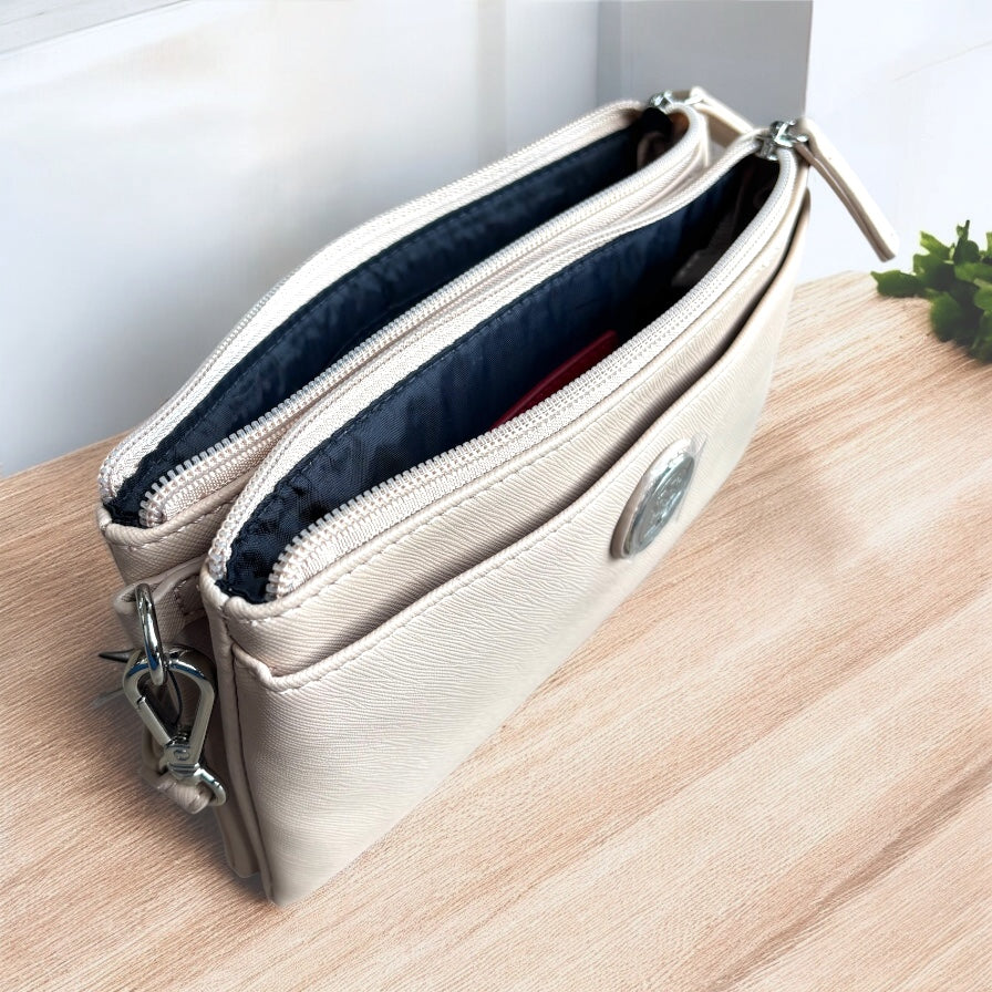 Muñequera Tommy H nude doble cierre placa plateada