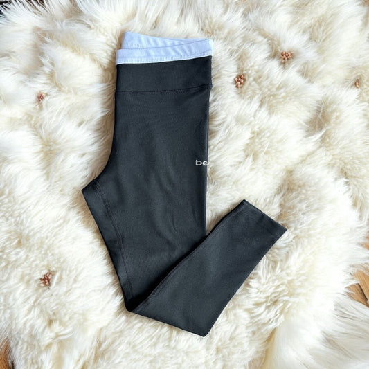 Leggings Bebe negro letras con cintura color blanco