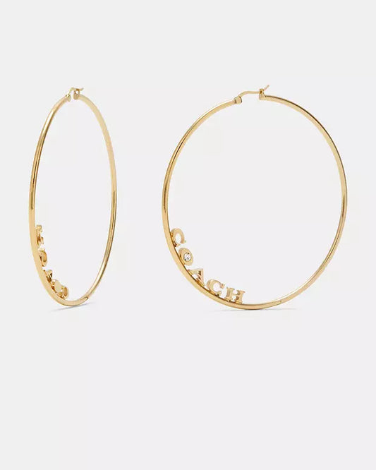 Arracadas Coach doradas Hoop Earrings grandes