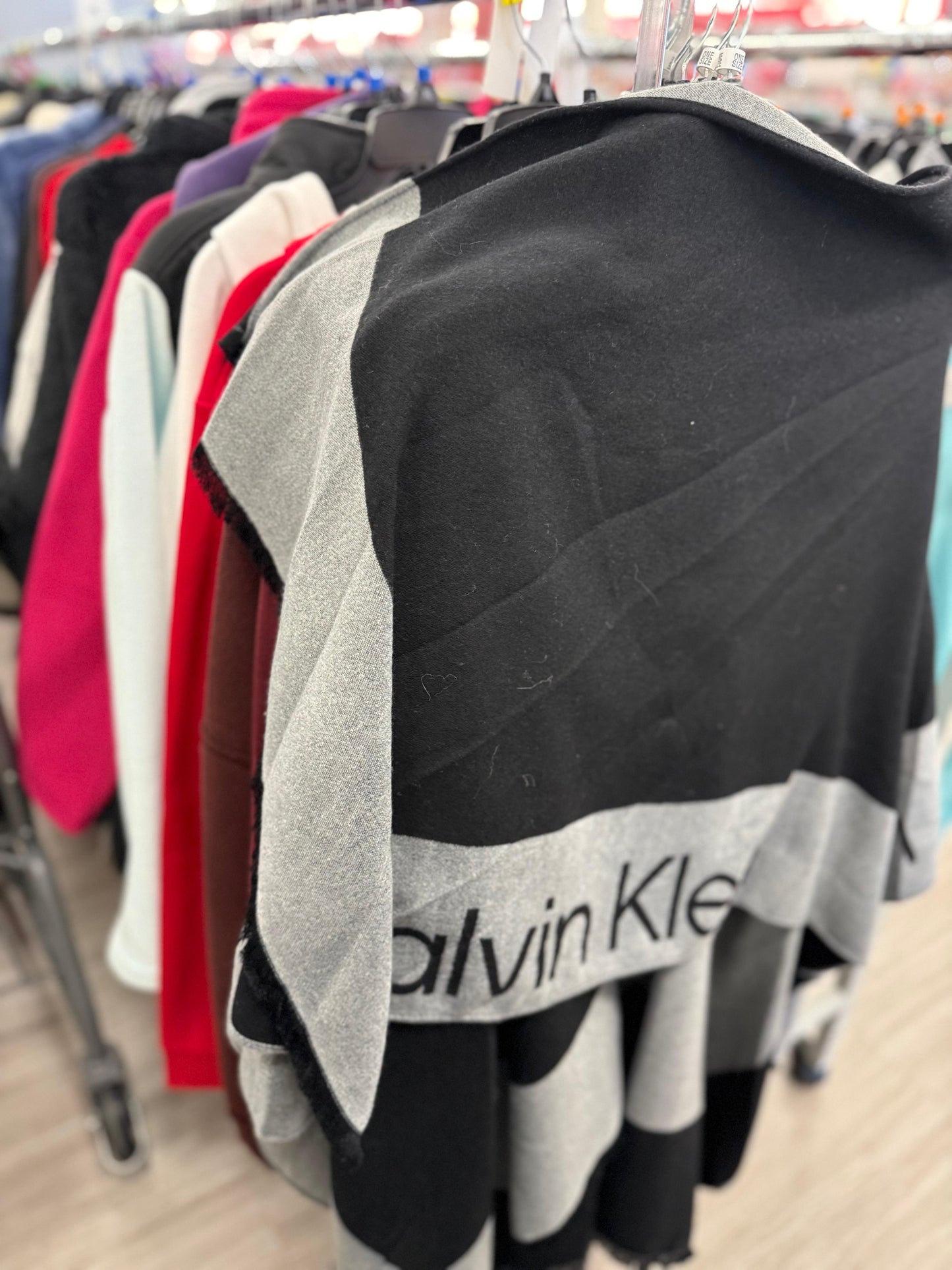 Poncho Calvin k negro/gris