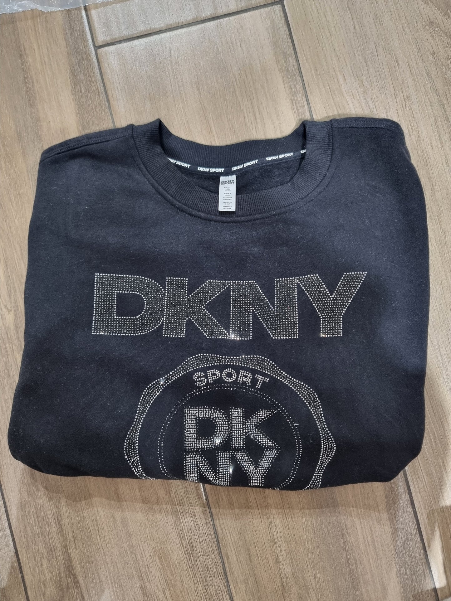 Sudadera DKNY negra de brillos