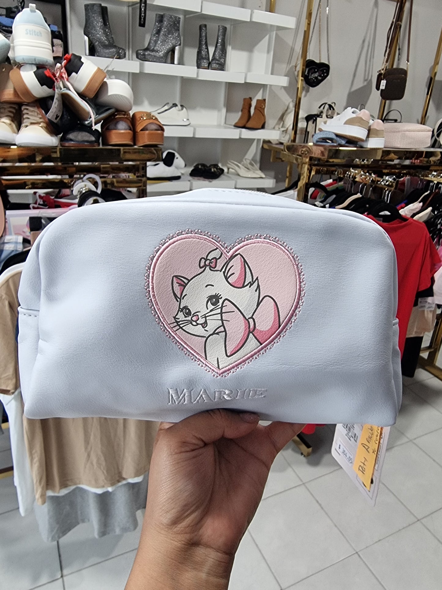 Cosmetiquera Primark Disney de Marie azul