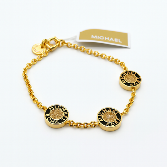 Pulsera Michael K dorada con negro