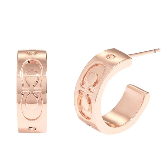 Arracadas Coach rose gold