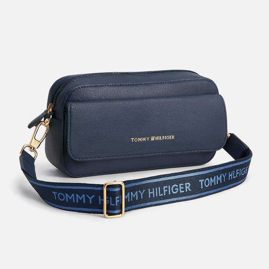 Crossbody Tommy H azul marino paca en letras doradas