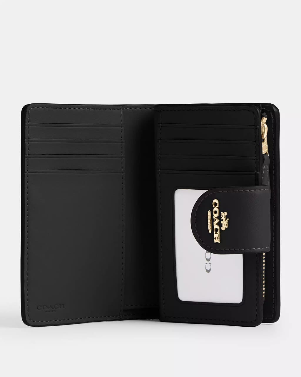 Cartera Coach médium corner zip wallet in signature canvas