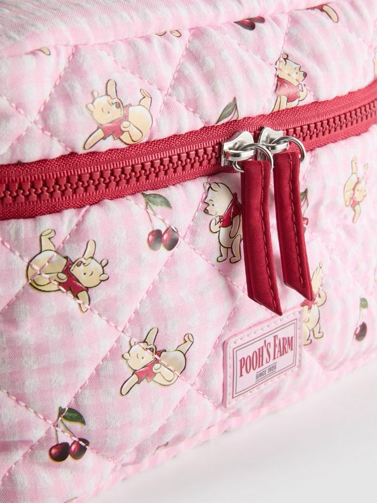Cosmetiquera Primark de Disney Winnie Pooh rosa con rojo