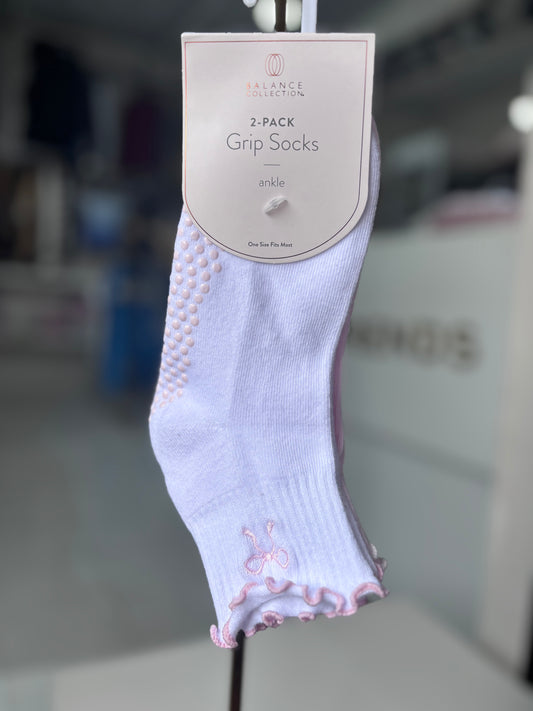 Calcetas con agarre rosa y blanco con moño
