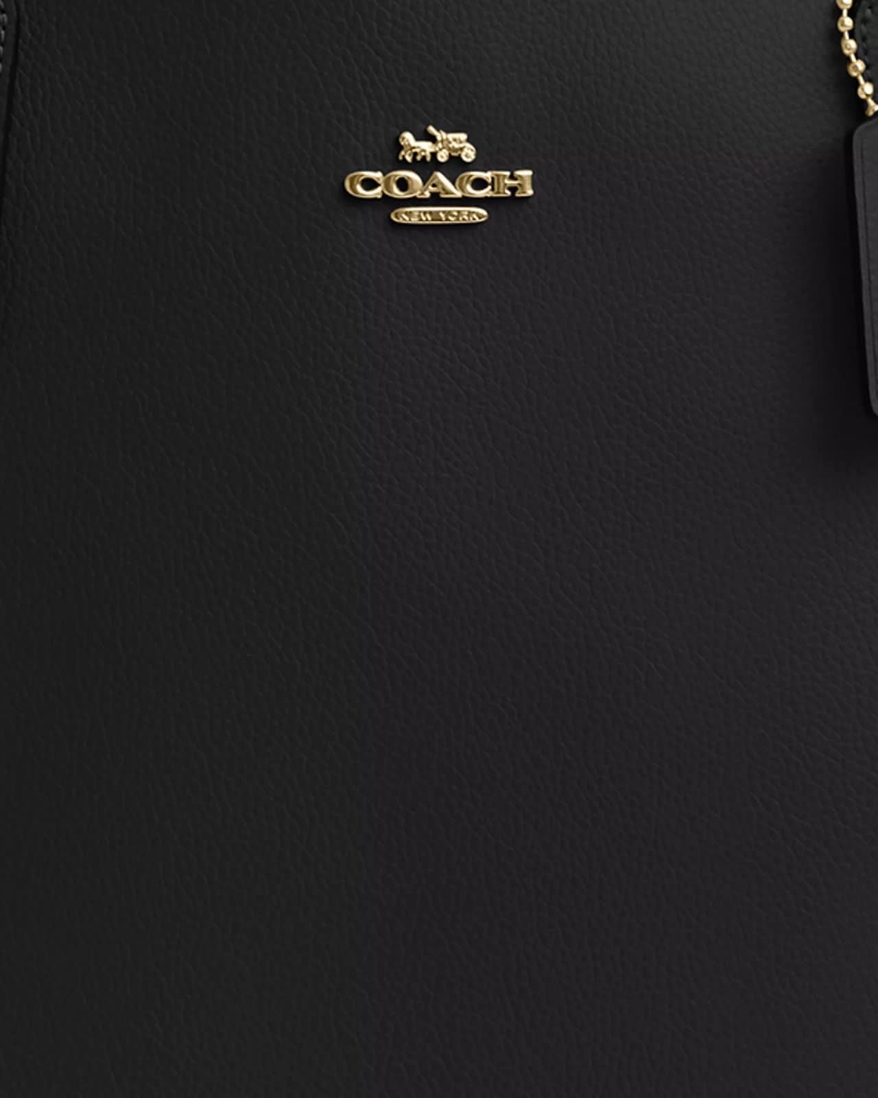 Tote Coach negra, grande con placa dorada