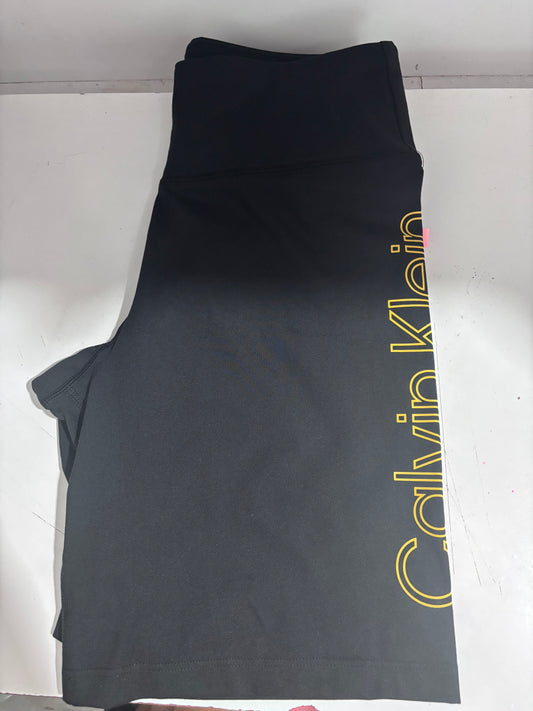 Short Calvin K negro letras amarillas