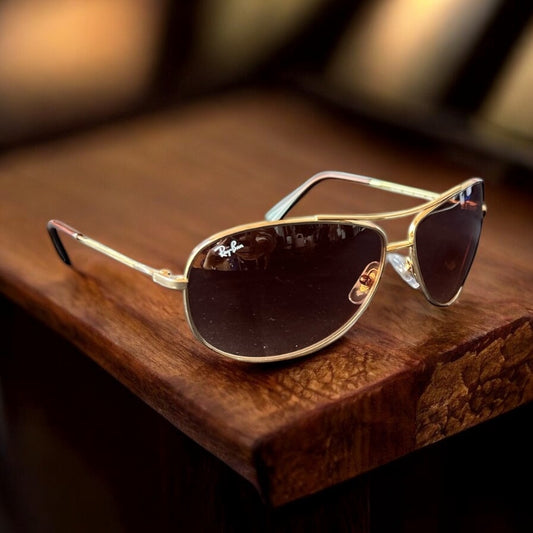 Lentes Ray ban café con dorado caballero