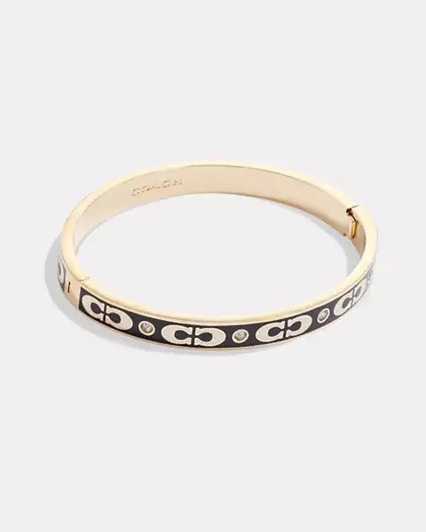 Brazalete Coach dorado/negro