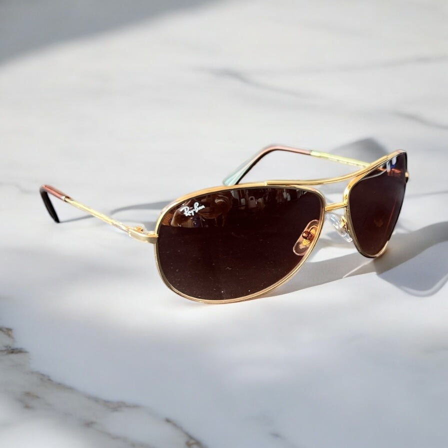 Lentes Ray ban café con dorado caballero