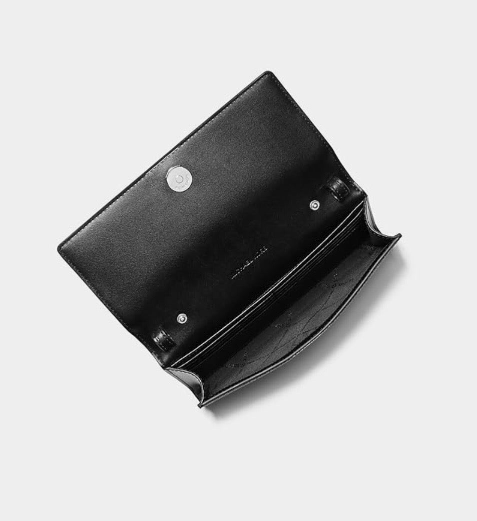 Crossbody Michael K negra con monogram