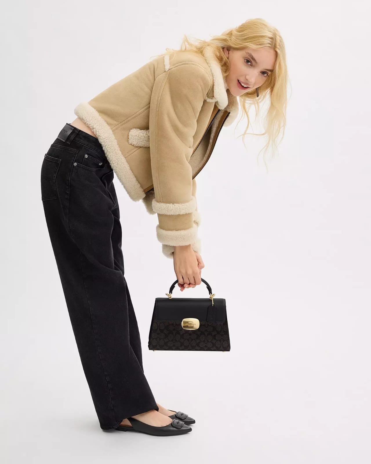 Crossbody Coach café con monogram Eliza