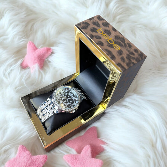 Reloj Bebe plateado con animal print