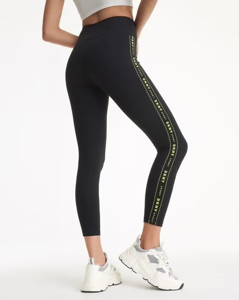 Leggings DKNY negro, letras verde neón en costados