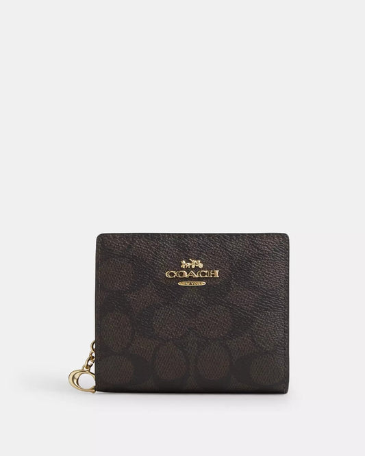 Cartera Coach Snap wallet in signature canvas