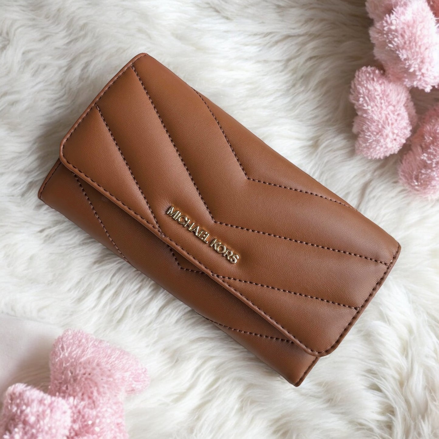 Cartera Michael K café acolchonada