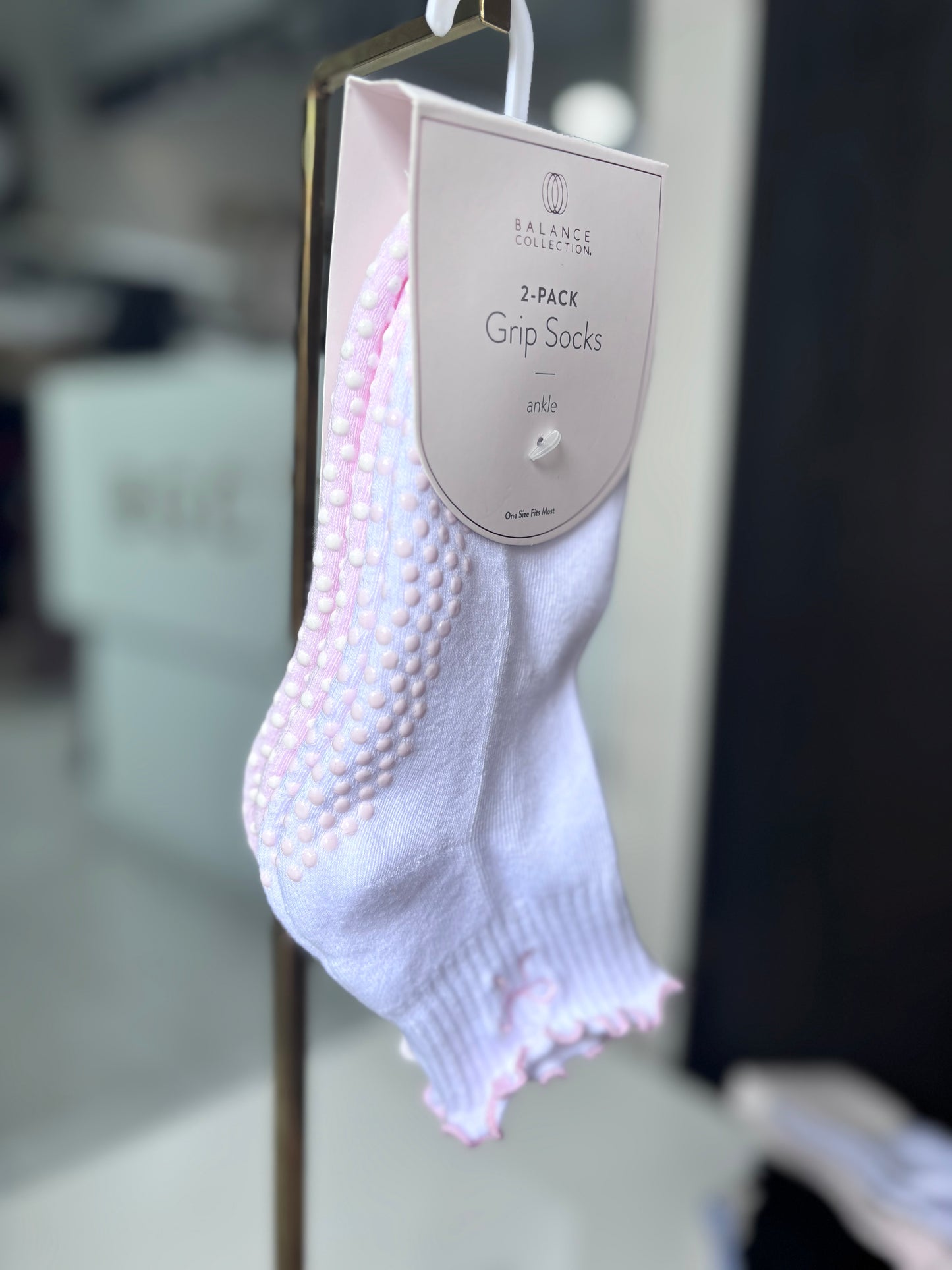 Calcetas con agarre rosa y blanco con moño