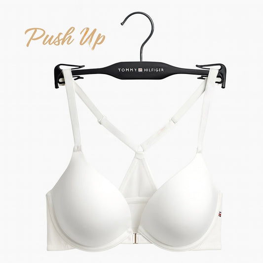 Brasier TommyH blanco, strap cruzado y broche plateado enfrente