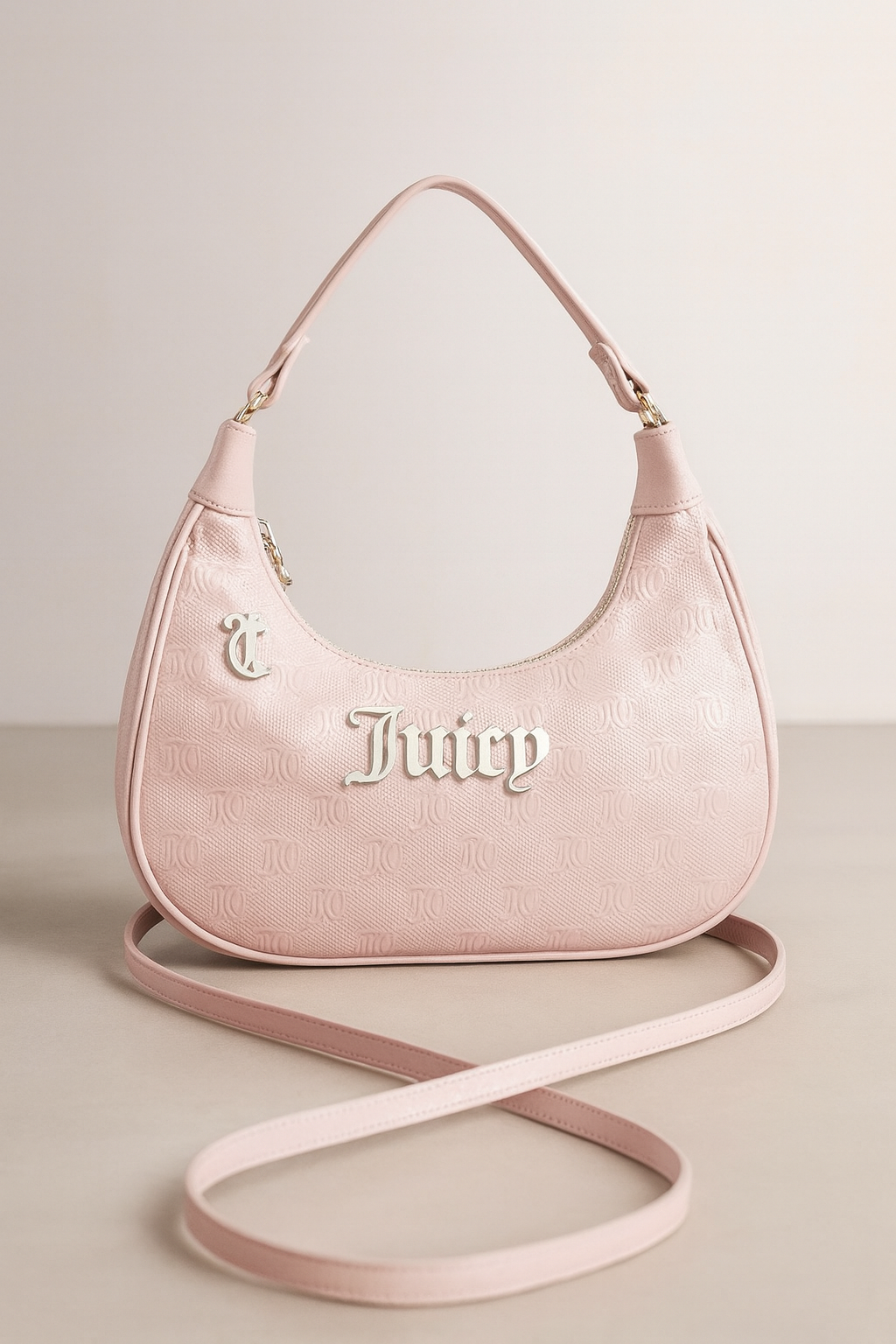 Crossbody Juicy C palo de rosa tipo charol con detalles dorados
