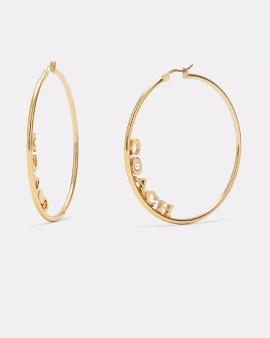 Arracadas Coach dorados Hoop Earrings